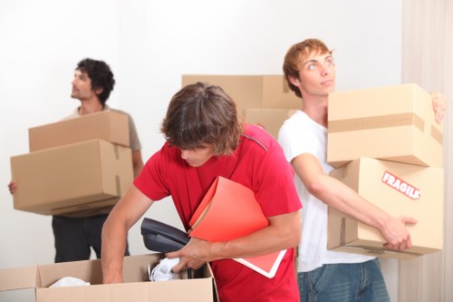 Packed boxes and labels prepared for removals in Heston
