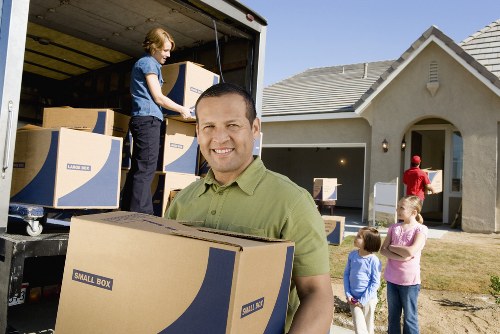 Small business relocation with boxes and office equipment